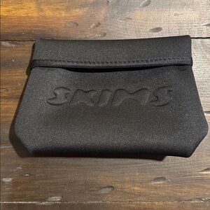SKIMS Black Neoprene Pouch